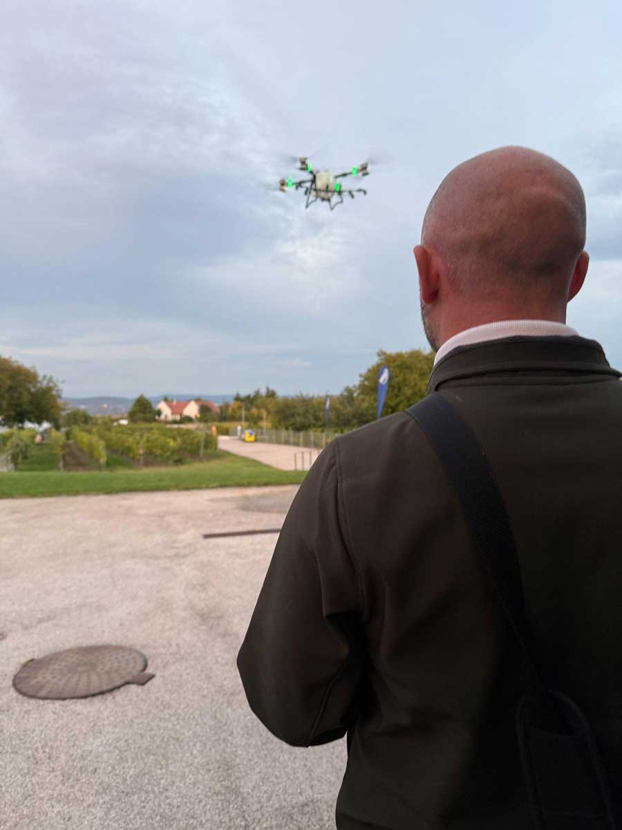 Dan from Drone Sales UK flying an agricultural drone during product demos in Budapest
