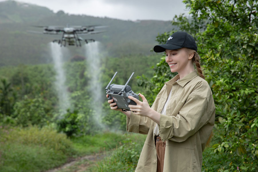 DJI Agras T100 spraying crops