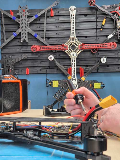 Drone Sales UK repair centre with drones and ISO 9001 certification