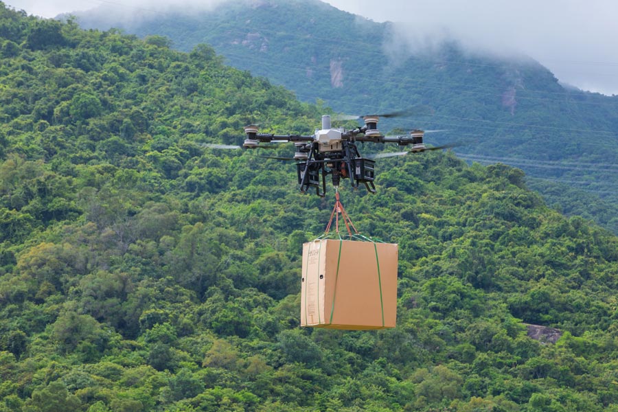 DJI FlyCart 100 carrying cargo