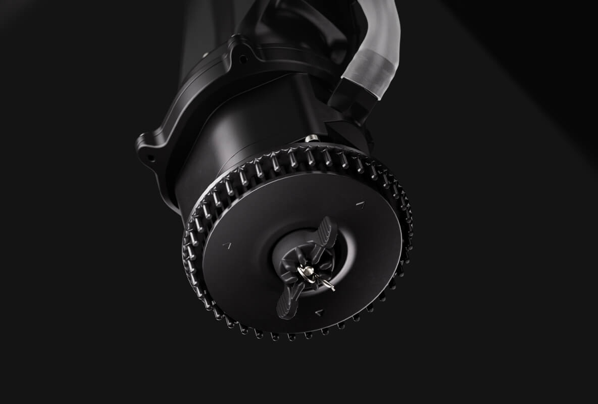 Close up view of the water-cooled centrifugal motor housing and misting disc assembly